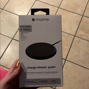 A brand new never opened charging pad